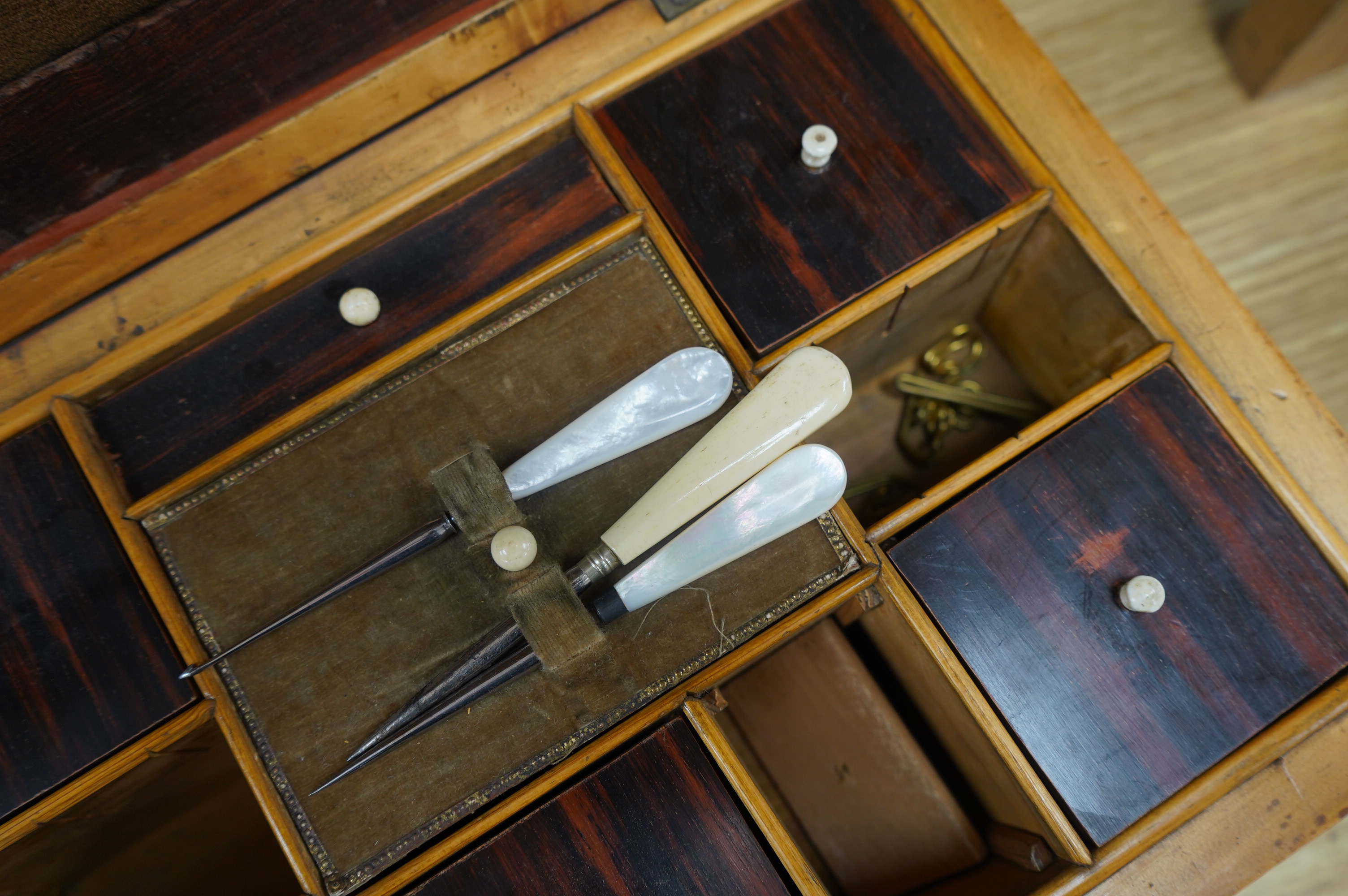 A 19th century mahogany work box and two tea caddies, largest work box 29cm wide, 20cm deep (3). Condition - poor to fair